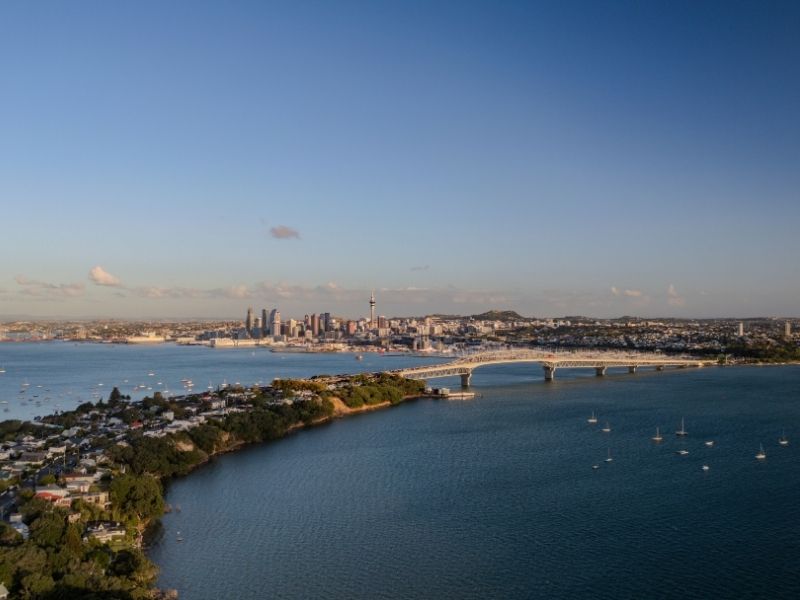 A view of Auckland Harbour looking over the harbour bridge towards the central business district.