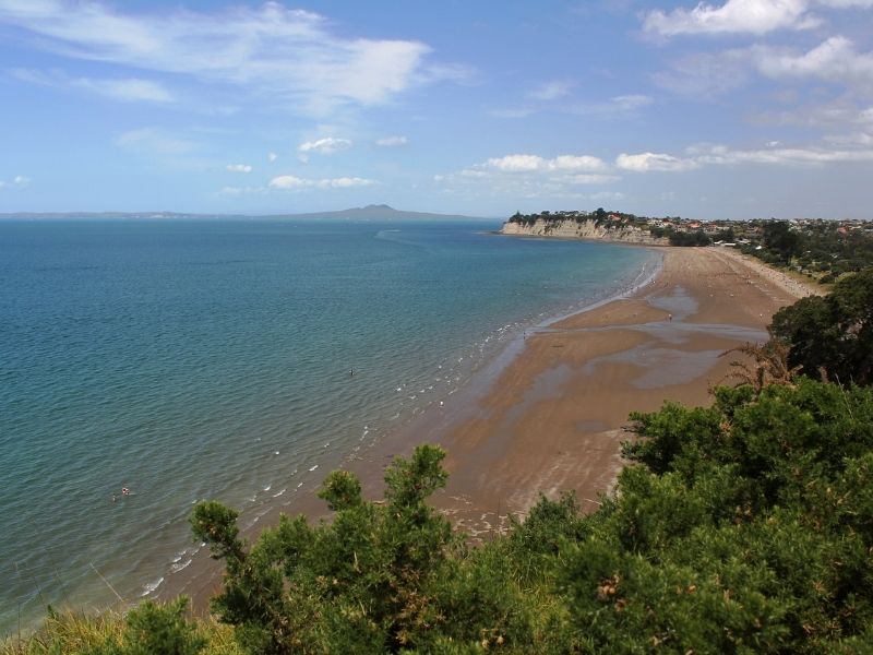 Looking south over Long Bay Beach in Auckland, New Zealand.